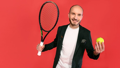 Man with stick and ball